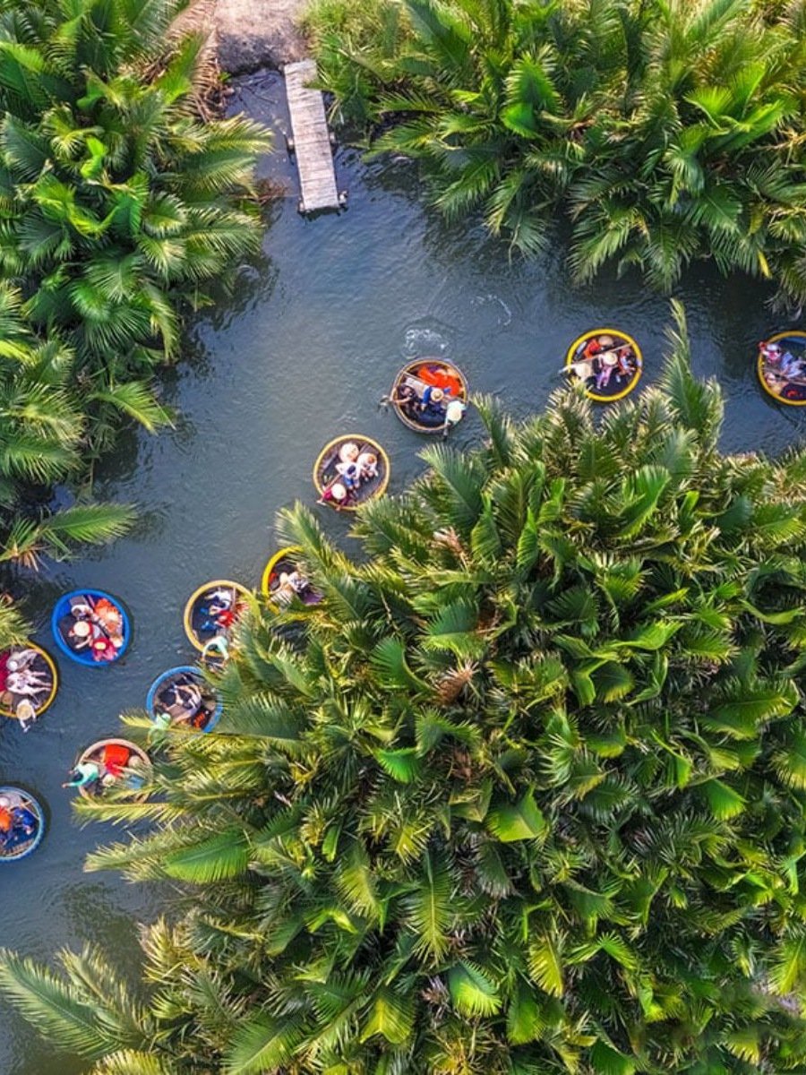 coconut boat ride hoi an 02 1689698072 1 - Vietnam Weather In July | Best Places & Outdoor Activities To Do