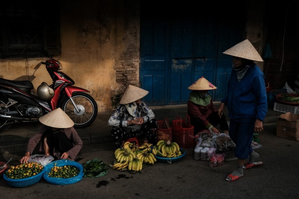 Fruit selling on Hoi An street. Photo by VIA Ambassador Etienne Bossot - Weather in Central Vietnam: Your Helpful Travel Guide